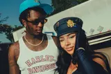 Young Thug Kneels to Mariah the Scientist During Concert... Jumbotron Displays 
