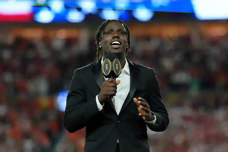 Jan 19, 2026; Miami Gardens, FL, USA; Jamal Roberts sings the national anthem before the CFP National Championship college football game between the Indiana Hoosiers and the Miami Hurricanes at Hard Rock Stadium. Mandatory Credit: Kirby Lee-Imagn Images\n