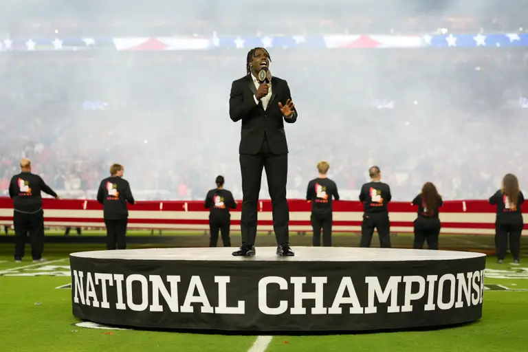 Jan 19, 2026; Miami Gardens, FL, USA; Jamal Roberts sings the national anthem before the CFP National Championship college football game between the Indiana Hoosiers and the Miami Hurricanes at Hard Rock Stadium. Mandatory Credit: Kirby Lee-Imagn Images\n
