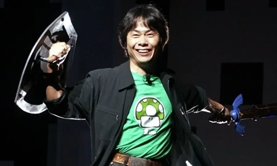 E3 발표 석상에 〈젤다의 전설〉 무기를 착용하고 나온 미야모토 시게루