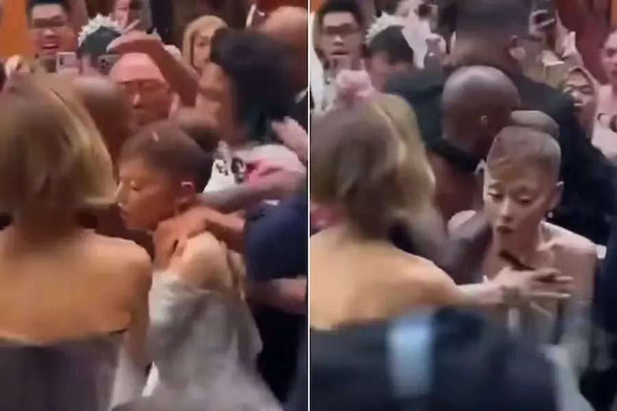 Audience rushing to hug actress Ariana Grande at the movie 'Wicked' Singapore premiere red carpet./X Capture