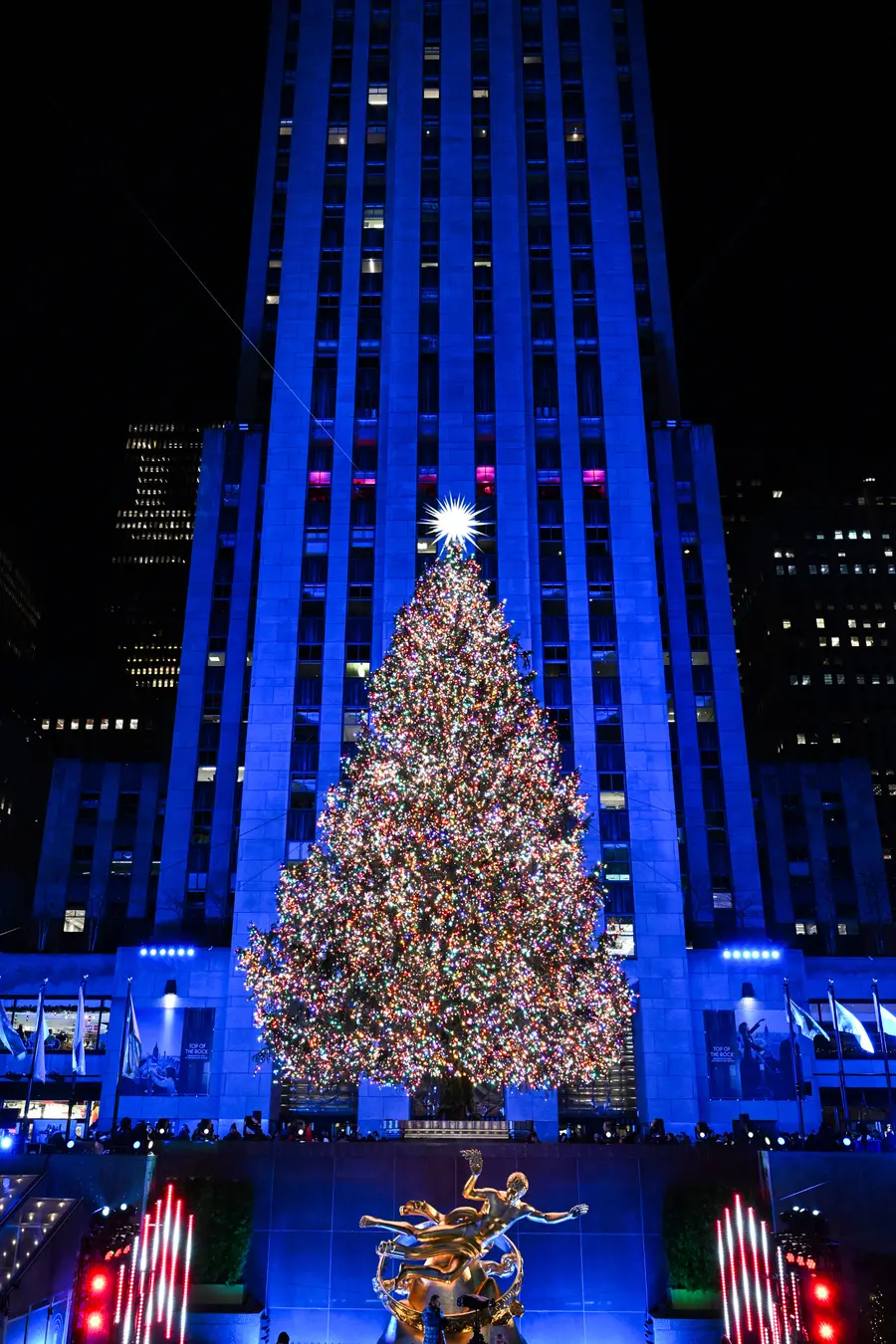 The 2025 Rockefeller Center Christmas Tree is lit for the season on Wednesday, Dec. 3, 2025 in New York. The 75-foot tall, 11-ton Norway Spruce from East Greenbush, NY, is decorated with 57,350 multi-colored, energy-efficient LED lights and a Swarovski crystal star. (Diane Bondareff/AP Content Services for Tishman Speyer) THIS PHOTO WAS TAKEN BY AP CONTENT SERVICES FOR TISHMAN SPEYER