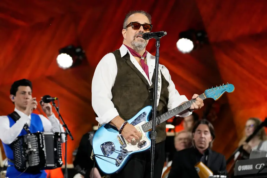 Frontman Raul Malo, center, and The Mavericks perform during the Boston Pops Fireworks Spectacular in Boston on July 4, 2024. 