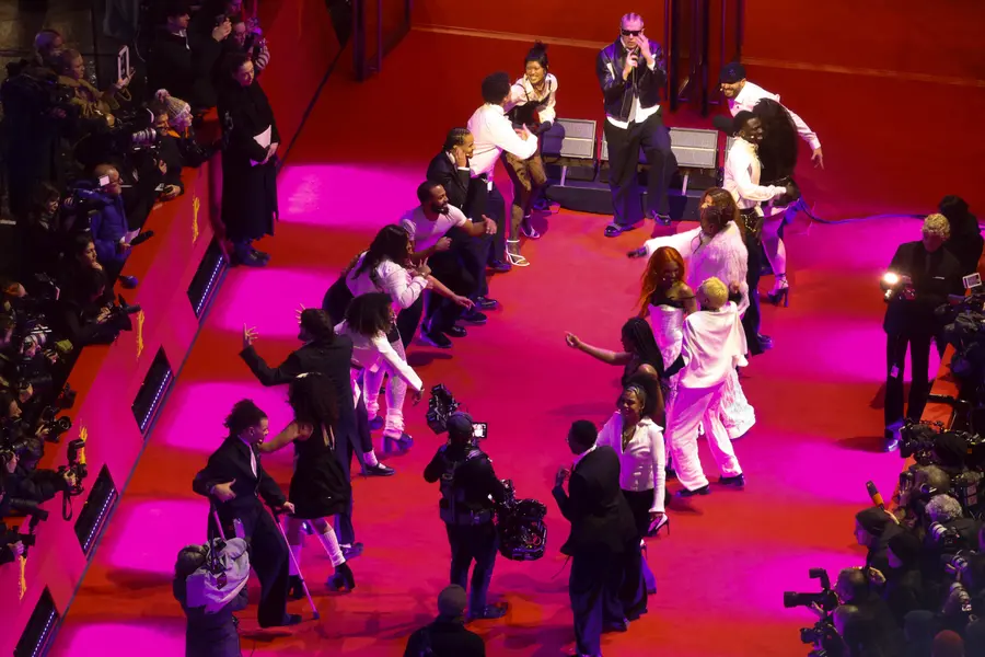 Rapper Soho Bani delivers a passionate performance on the red carpet at the opening ceremony. /REUTERS