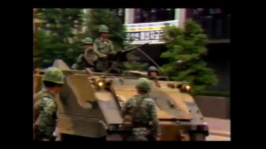 Gwangju Uprising footage inserted into the work