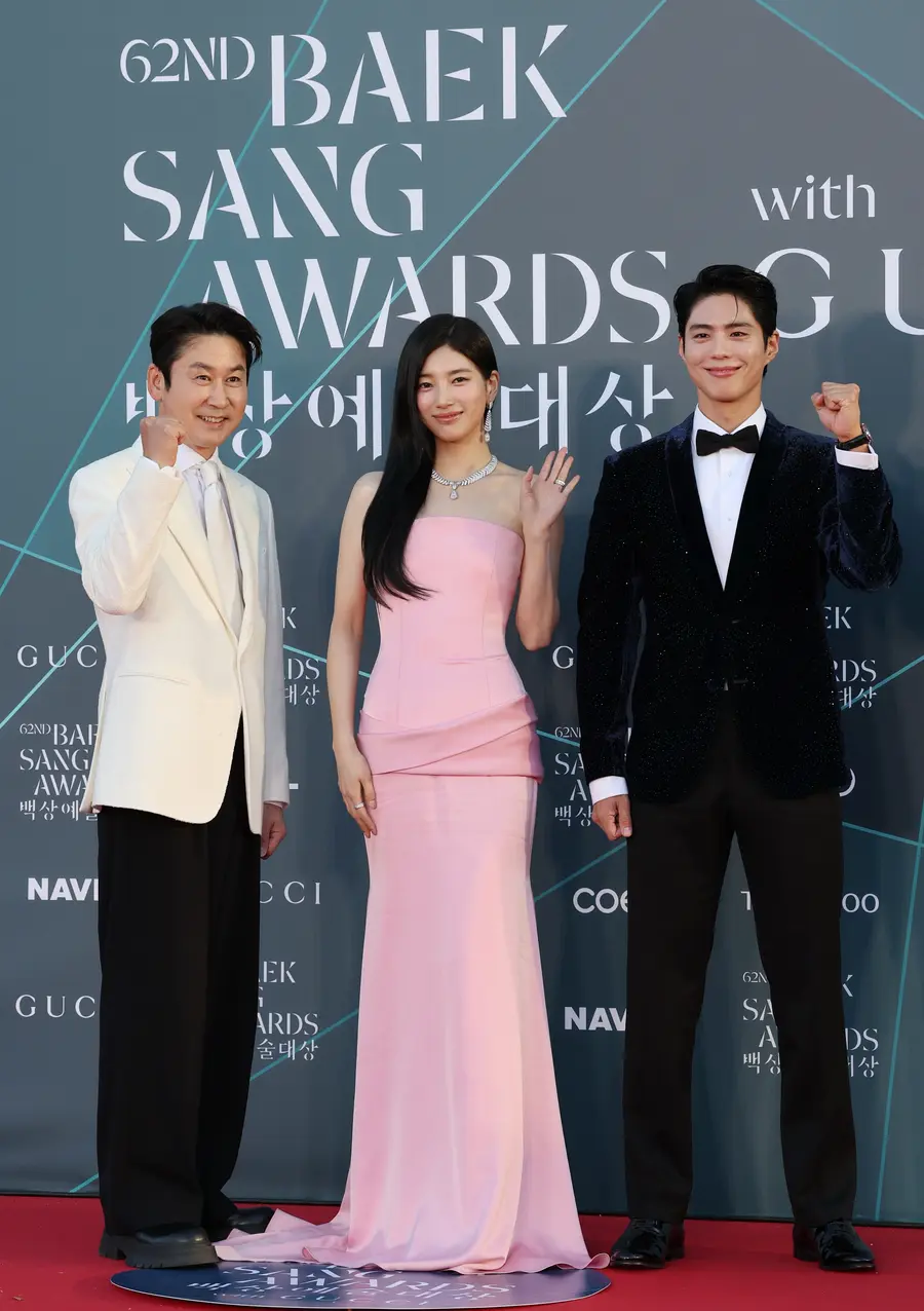 Comedian Shin Dong-yeop (from the left), singer Suzy, and actor Park Bo-gum at the 62nd Baeksang Arts Awards ceremony, serving as MCs