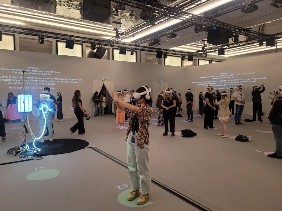 Cannes Film Festival attendees experiencing the extended reality work ‘BOOOOOO-PEEEEEEEE’ [Photo courtesy of the Cannes Film Festival]