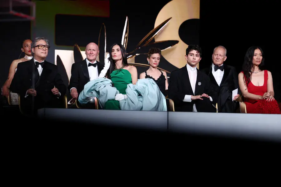 The 79th Cannes International Film Festival Palme d’Or winner director Cristian Mungiu and jury chair director Park Chan-wook [REUTERS=Yonhap News]