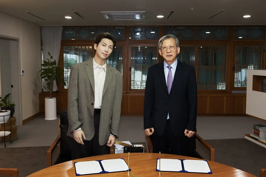 BTS RM named global publicity ambassador of the National Museum of Korea From left: RM of Bangtan Sonyeondan (BTS), the director of the National Museum of Korea [Provided by the National Museum of Korea. No resale or database use]